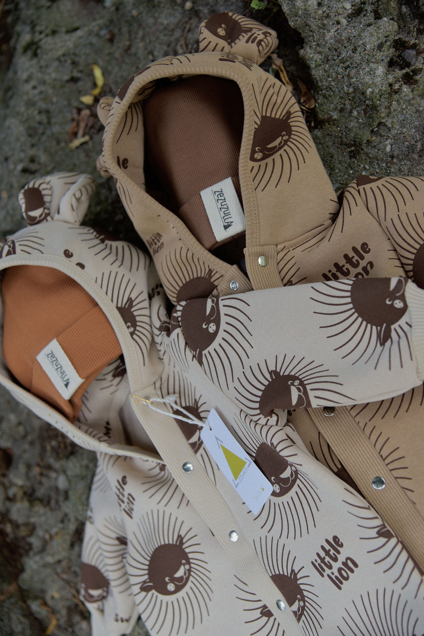 Eared Jumpsuit for Babies and Kids - Lion on Cacao